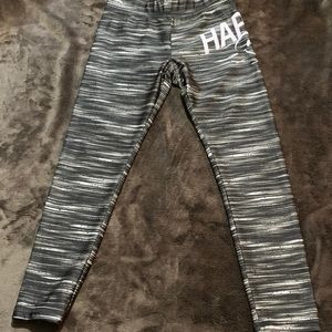 Justice “HAPPY” leggings.